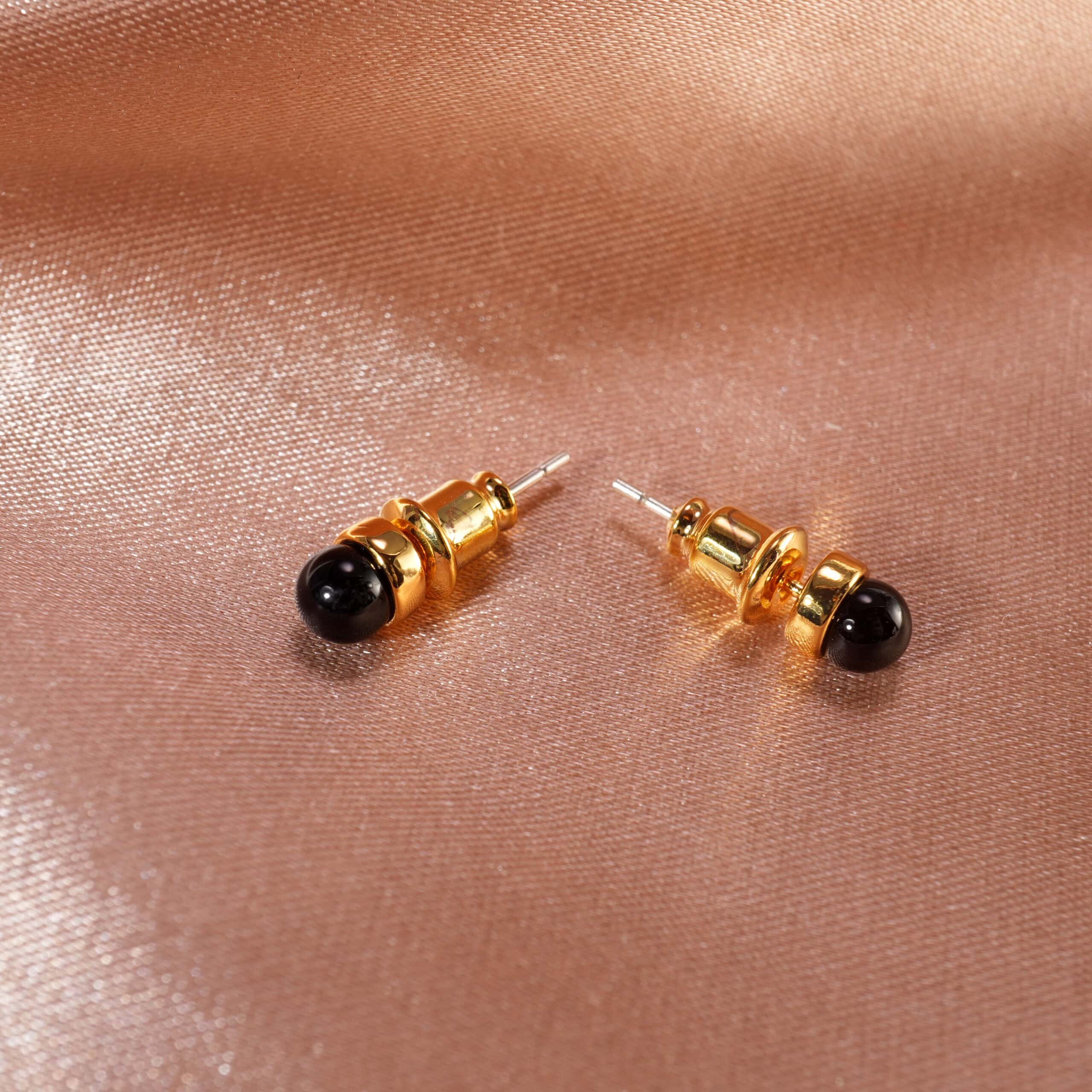 18k-gold-plated-black-tourmaline-mini-stud-earrings-02 18K gold-plated black tourmaline mini stud earrings on a neutral background