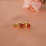 Close-up of the smooth carnelian stone and setting