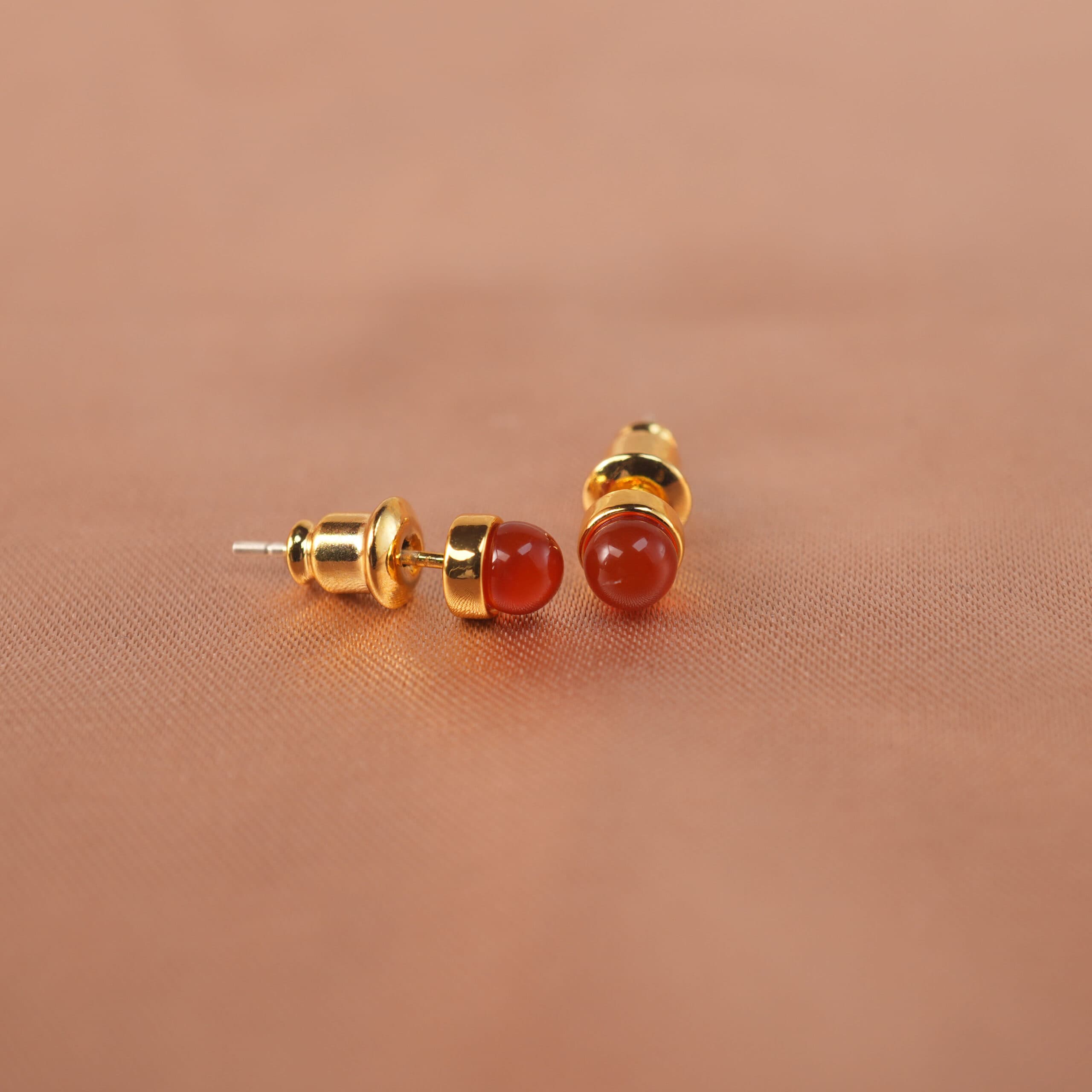 18k-gold-plated-red-agate-stud-earrings-02 Pair of carnelian stud earrings with deep orange glow
