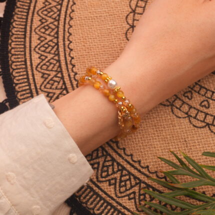 Double-layer Tiger Eye bracelet worn on wrist – adjustable and elegant look