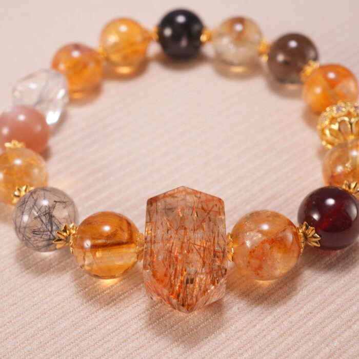 Close-up of faceted citrine beads and smooth gemstone texture