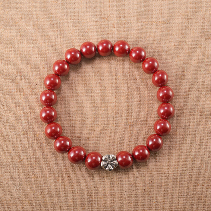 Handmade cinnabar bracelet with detailed red flower beads