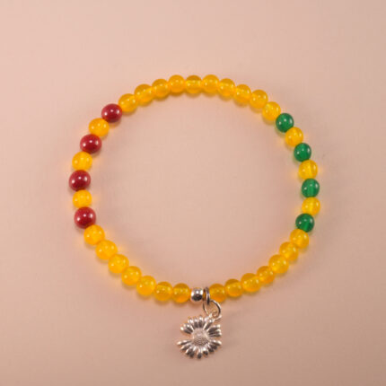 Handmade yellow agate and cinnabar charm bracelet with gold-toned accents