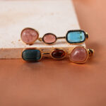 Close-up showing the different colors and textures of each gemstone