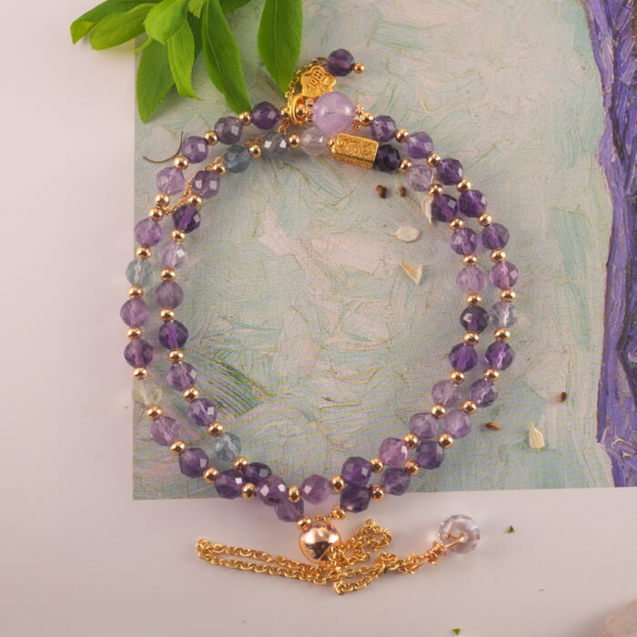 Woman meditating wearing amethyst double wrap bracelet for relaxation and restful slee