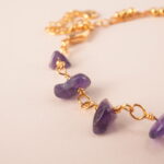 Detailed view of beaded amethyst bracelet design and cord
