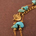 Detail of polished turquoise green beads and double-layer design