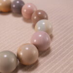 Close-up of natural stone heart bracelet showing handcrafted details