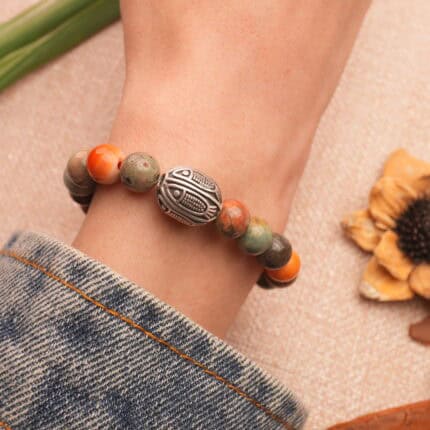 Woman wearing beaded bracelet – handcrafted natural stone jewelry for daily grounding