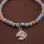 Close-up of the Alashan stone beaded bracelet, highlighting the beads and S925 sterling silver accents