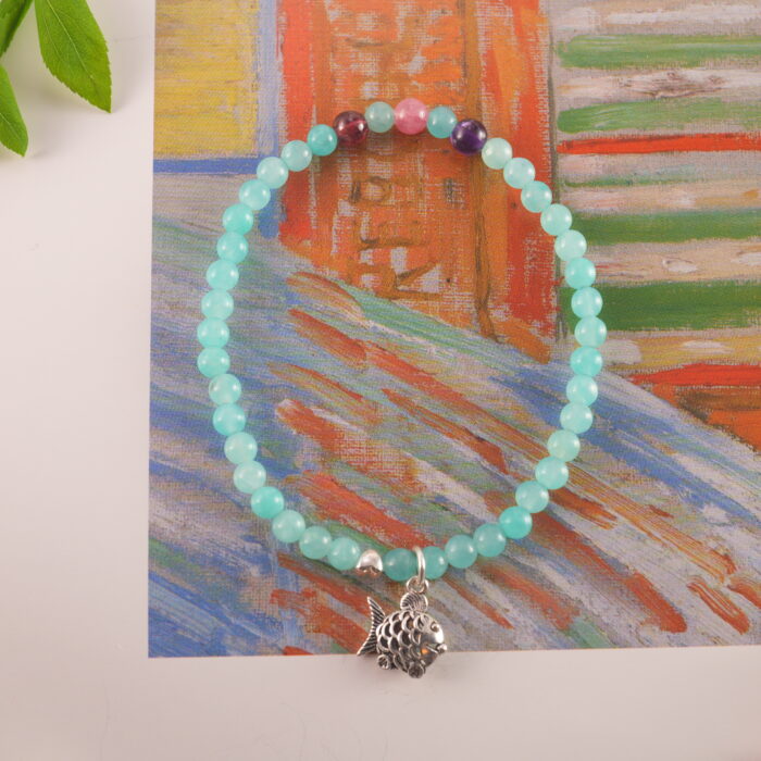 Charm Bracelet with Multi Gemstones in a Natural Light Setting
