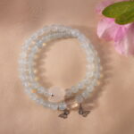Aquamarine and Kyanite Bracelet with Butterfly and Moon in Natural Light – Serene Setting