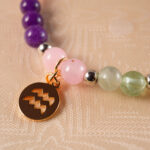Detailed shot of Aquarius bracelet beads and elastic stretch cord