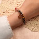 Aries Zodiac Bracelet worn on wrist with natural gemstone beads