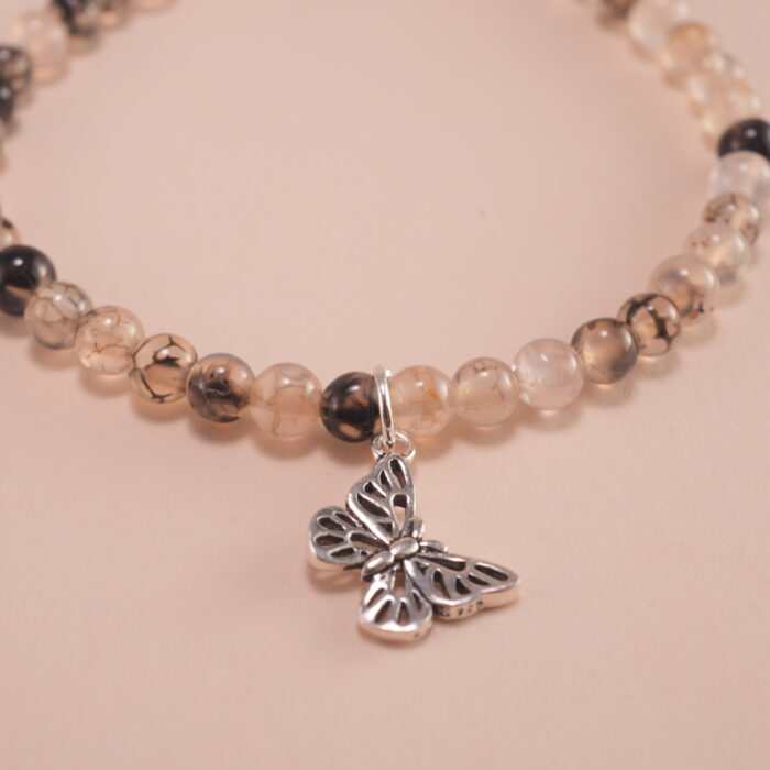 Close-up of black and white chalcedony beads with S925 spacer details