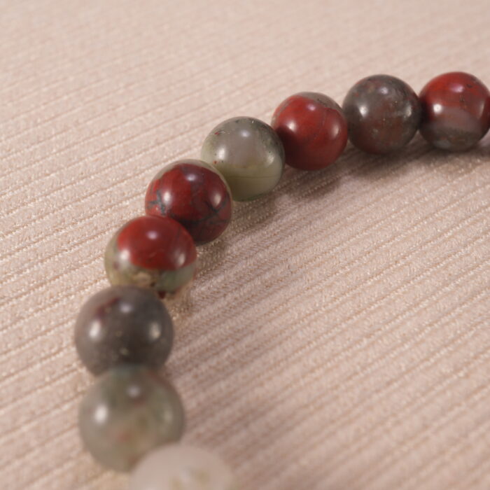 Close-up of polished Bloodstone beads with subtle S925 accents