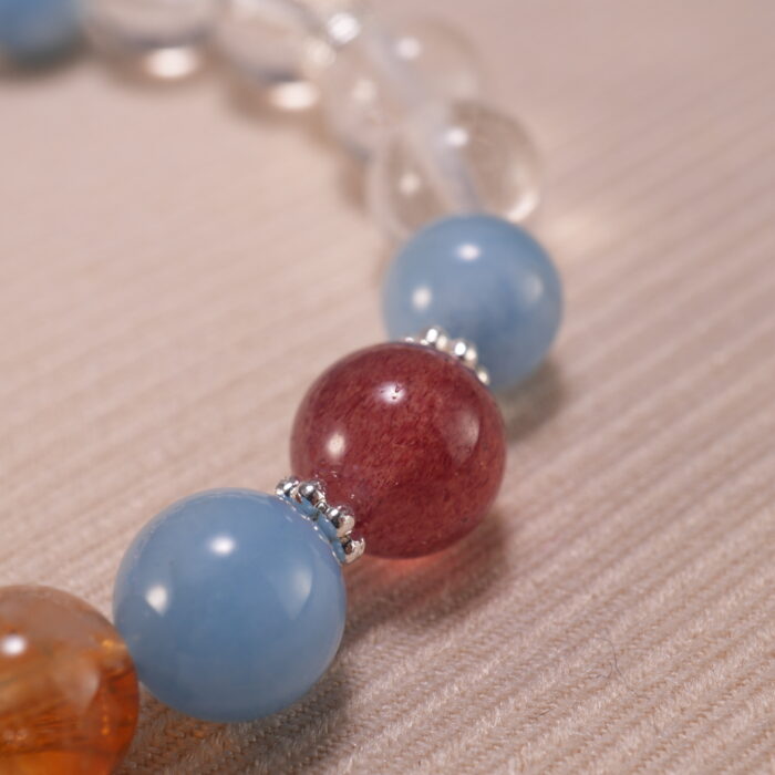 Close-up of Aquamarine, Citrine, Clear Quartz, and Strawberry Quartz Beads – Vibrant Crystal Bracelet