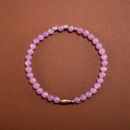 4mm amethyst beads on a simple background, showcasing their soothing lavender hue.