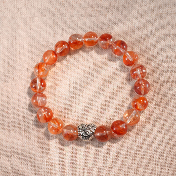 Red jelly opal 8mm heart-shaped bracelet on white background – natural stone jewelry
