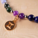 Detailed view of blue lace agate, dream amethyst, and prehnite beads showing color and texture