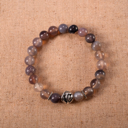 Discover calm and clarity with this handmade Gray Agate bracelet. Crafted with natural agate beads to support balance, grounding, and emotional peace.