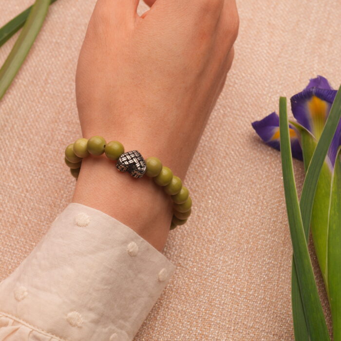 Model Wearing Green Alashan Stone Bracelet – Natural Energy Jewelry on Wrist