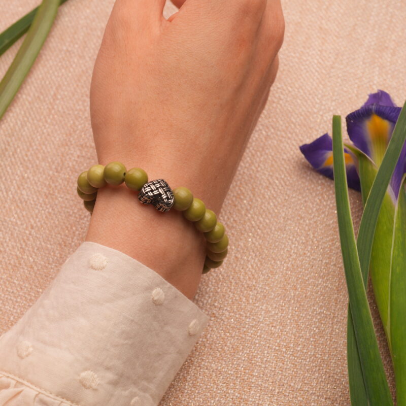 Model Wearing Green Alashan Stone Bracelet – Natural Energy Jewelry on Wrist