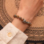 Wearing Kyanite Bracelet with Heart-Shaped Charm – Soothing Gemstone Jewelry