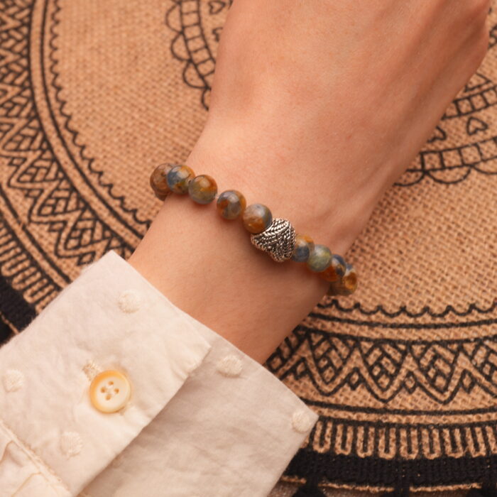 Wearing Kyanite Bracelet with Heart-Shaped Charm – Soothing Gemstone Jewelry