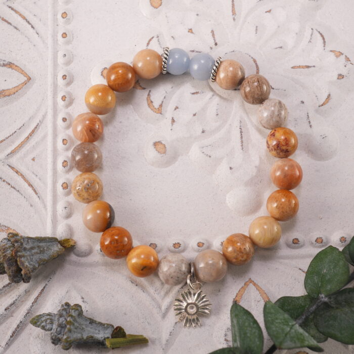 Landscape Stone & Blue Chalcedony S925 Bracelet placed on a natural surface, showcasing the calming design
