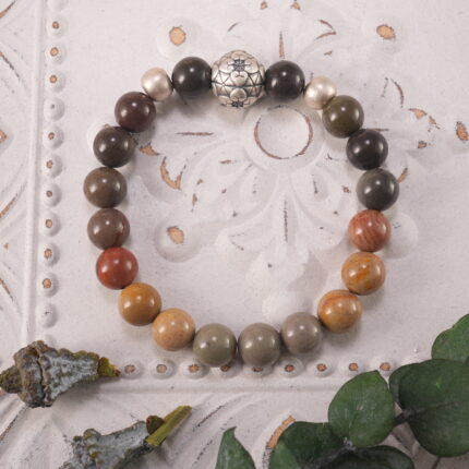 Landscape Stone S925 Stability Bracelet placed on a textured surface, showcasing its grounding energy
