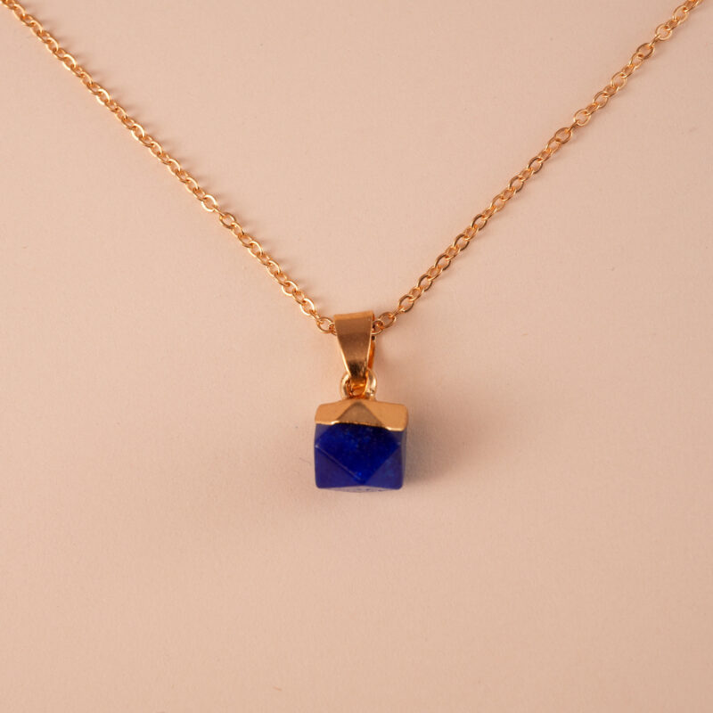 Close-up of lapis lazuli gemstone showing golden pyrite flecks