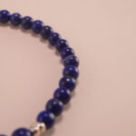 Close-up of Lapis Lazuli, Chalcedony Beads and S925 Silver Star Charm