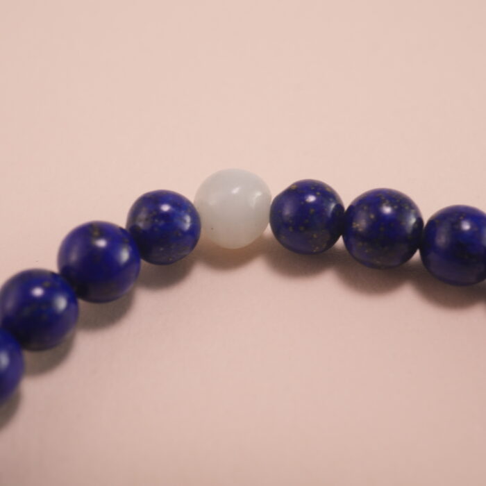 Close-up of Lapis Lazuli, Chalcedony Beads and S925 Silver Star Charm