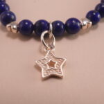 Close-up of Lapis Lazuli, Chalcedony Beads and S925 Silver Star Charm