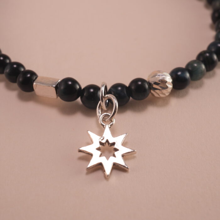 Close-up of Blue Tiger Eye Beads and Sterling Silver Charm – 4mm Gemstone Bracelet