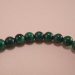 Close-up of 4mm Malachite and Amethyst Beads – Crystal Charm Bracelet for Luck and Peace