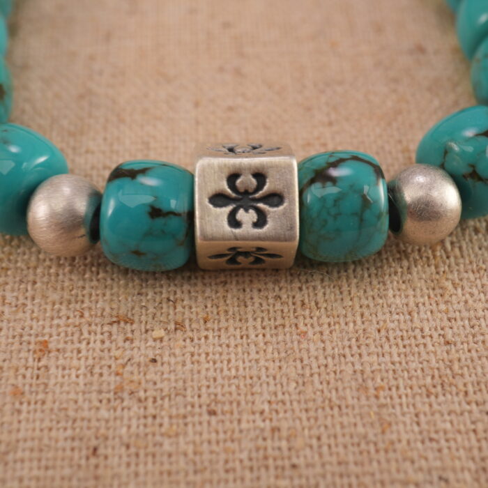 Detailed view of smooth turquoise beads showing natural patterns and polished texture