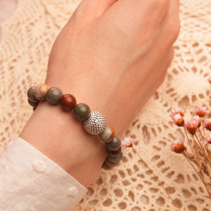 Close-up of men's wrist wearing the Landscape Stone Beaded Bracelet for strength, emotional balance, and steady energy