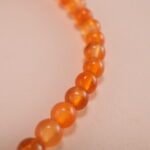 Close-up of Agate Beads and Star Charm – Natural Stone Bracelet Detail