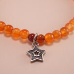 Close-up of Agate Beads and Star Charm – Natural Stone Bracelet Detail