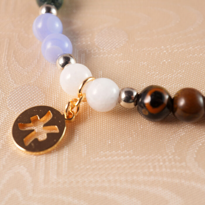 Close-up of Pisces crystal bracelet showing natural gemstone texture and color