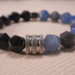 Close-up of bead texture and elastic cord connection, highlighting craftsmanship.