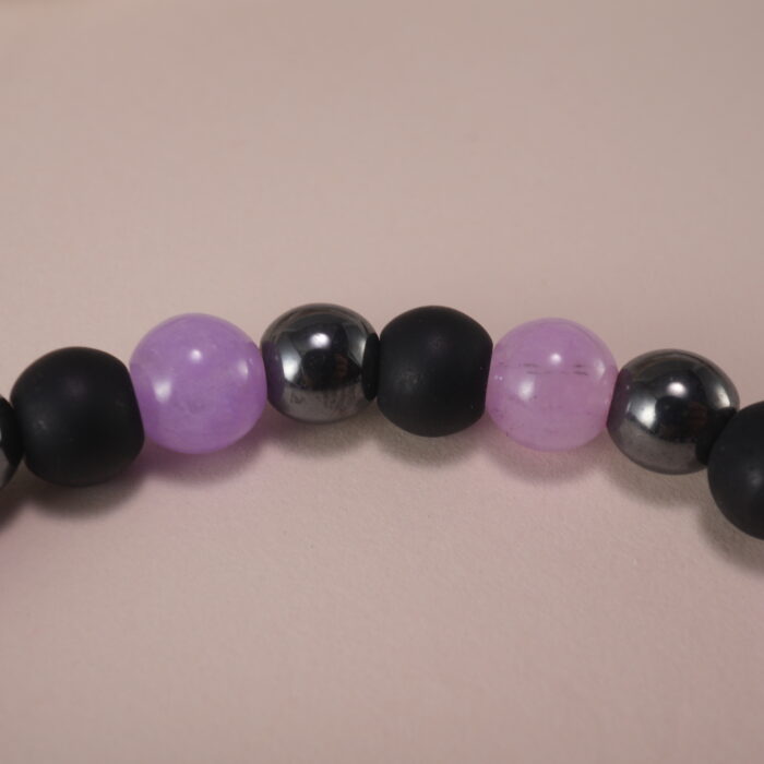 Close-up of polished beads showing colors and textures