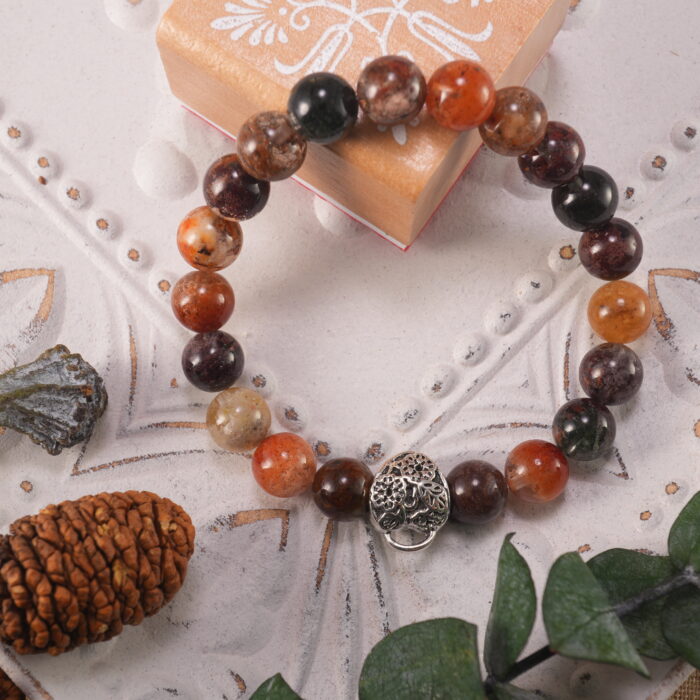 Bracelet displayed on neutral-toned fabric under daylight, symbolizing calm and protection