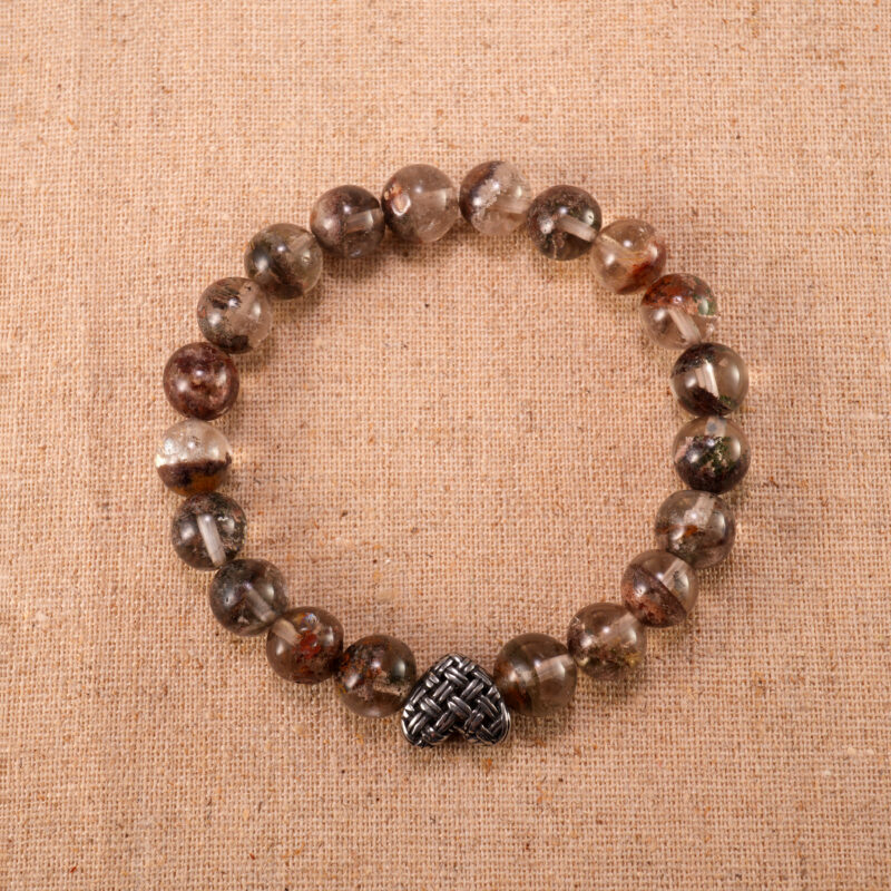 Phantom Quartz gemstone heart bracelet with 8mm beads and silver clasp on white background