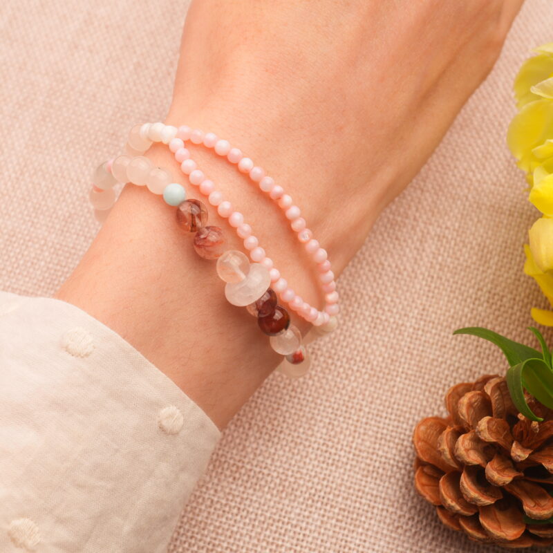 Wearing Double Wrap Bracelet with Red Phantom and Rose Quartz – Love and Grounding Energy
