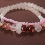 Close-up of Red Phantom Quartz and Rose Quartz Beads – Gemstone Bracelet for Emotional Healing