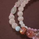 Close-up of Red Phantom Quartz and Rose Quartz Beads – Gemstone Bracelet for Emotional Healing