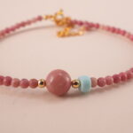 Close-up of the Rhodochrosite stone beads and adjustable cord